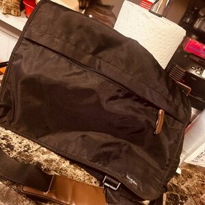 Black Canvas / Brown Leather Accents Messenger Bag.